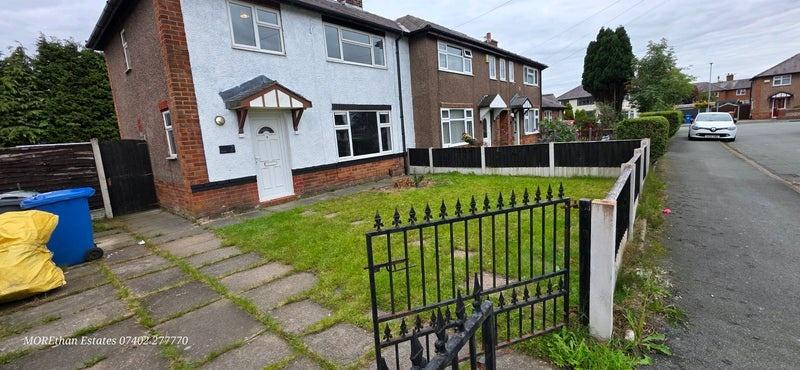 Semi with gated front lawn and driveway...