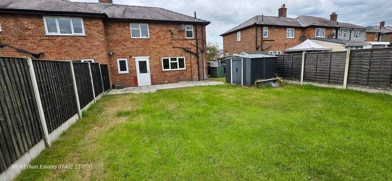 Spacious private rear garden with lawn and pati...