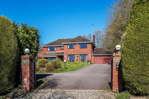 THE DOWNS, GIVONS GROVE, LEATHERHEAD, KT22