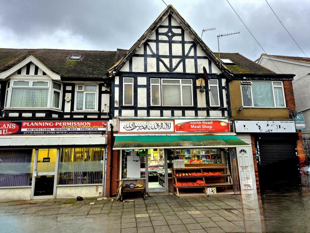 Freehold Retail Unit with Two-Bedroom Flat Above