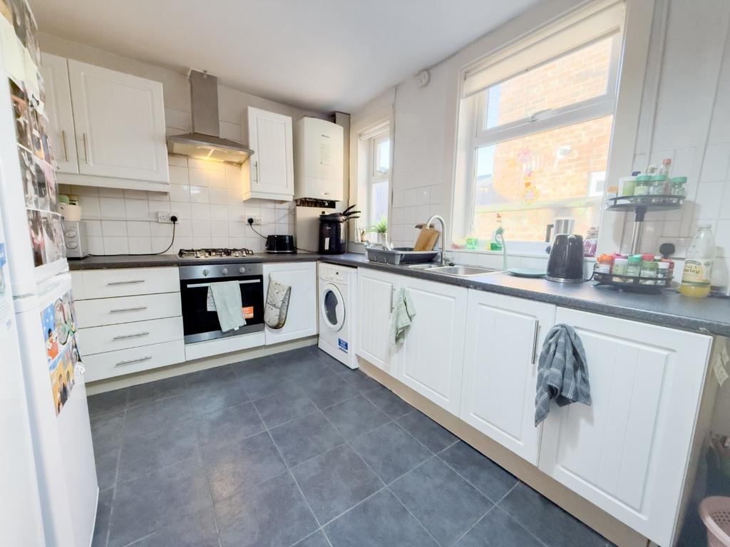Bright fitted kitchen with modern appliances...