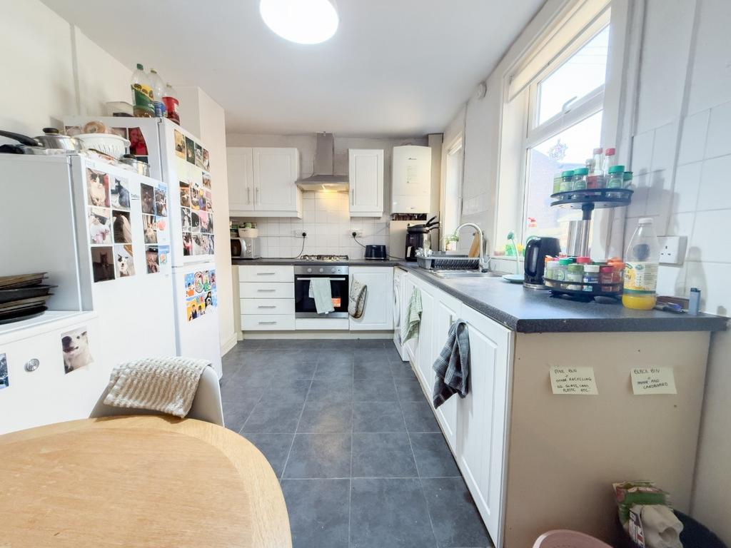 Bright modern kitchen with dining spot...