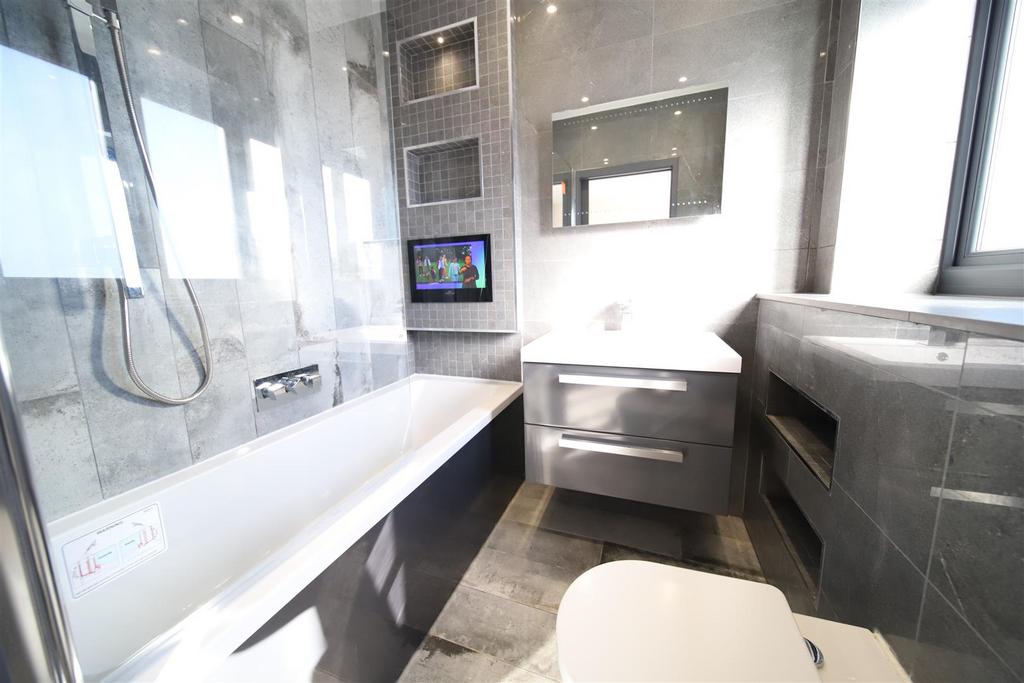 Bedroom 1 ensuite tv.jpg