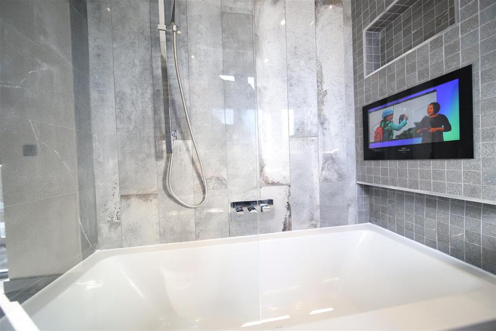 Bedroom 1 ensuite tv close.jpg