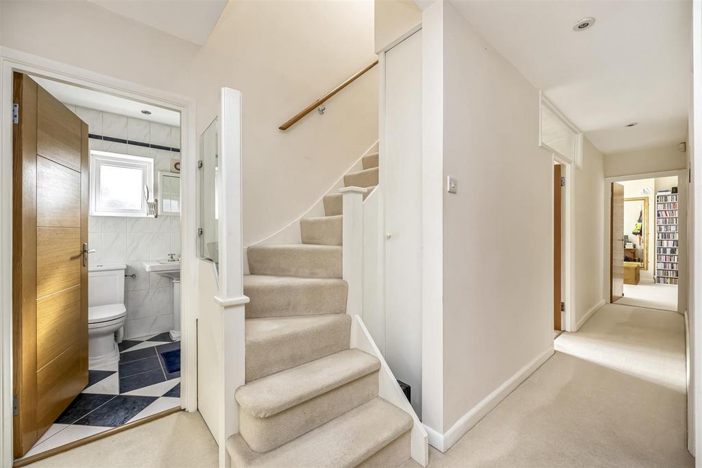Stairs rising to First Floor