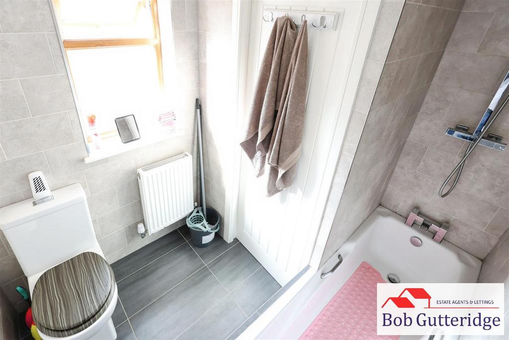 Luxury fully tiled bathroom
