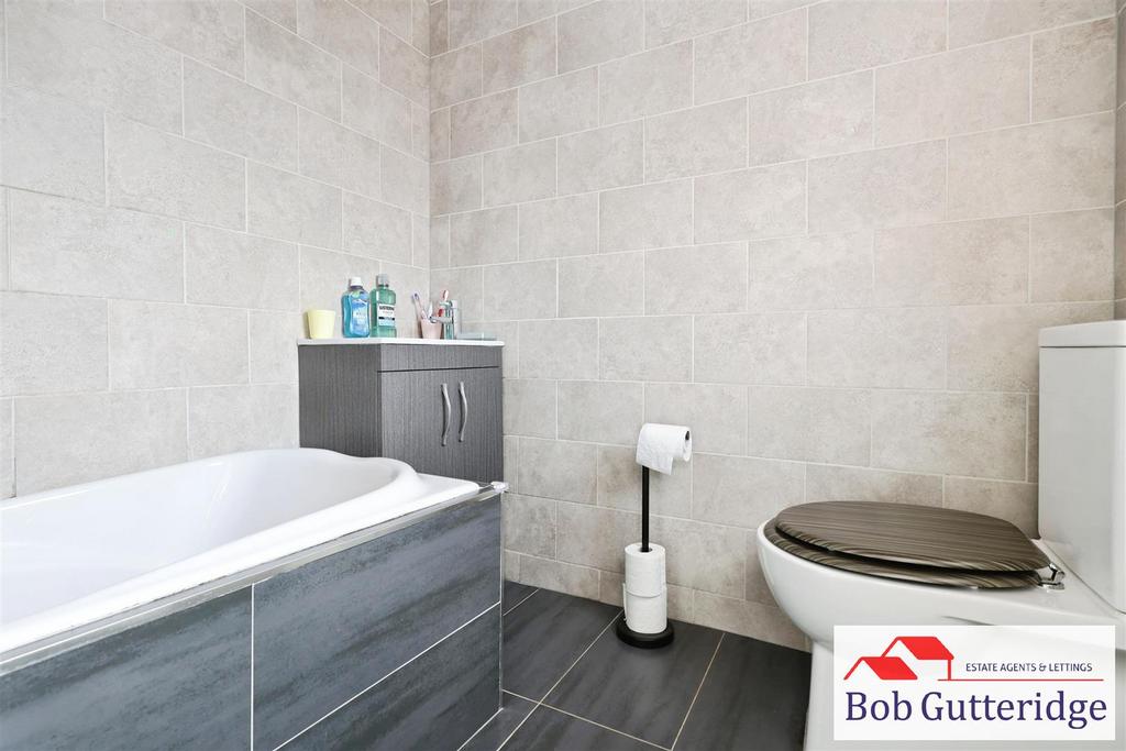 Luxury fully tiled bathroom