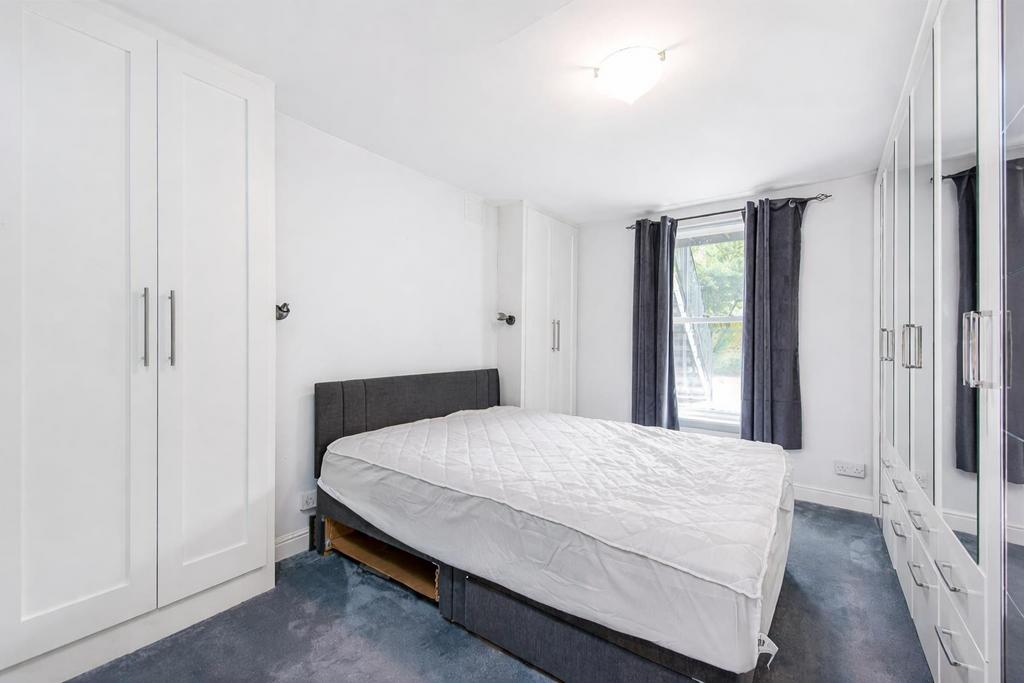 A photograph showcases a bright modern bedroom fe.