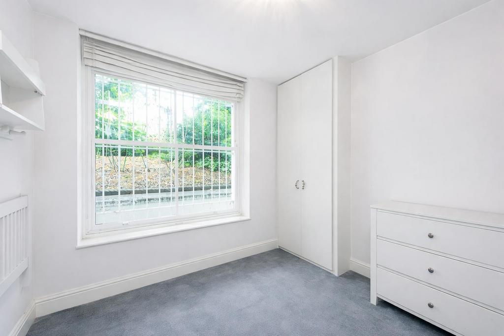 A photograph showcases an empty bedroom during day