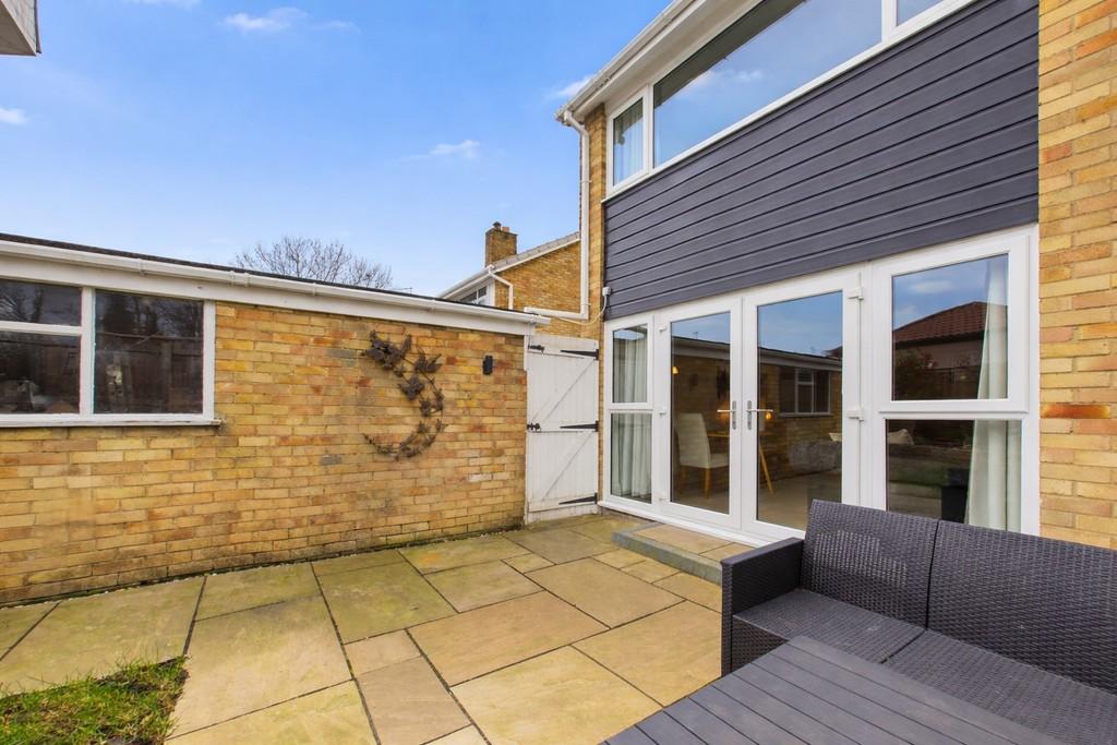 Modern backyard patio under clear sky (2)