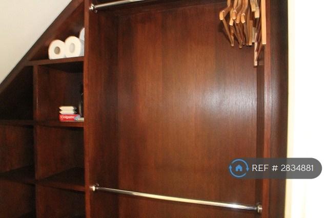 Under Stairs Walk In Wardrobe