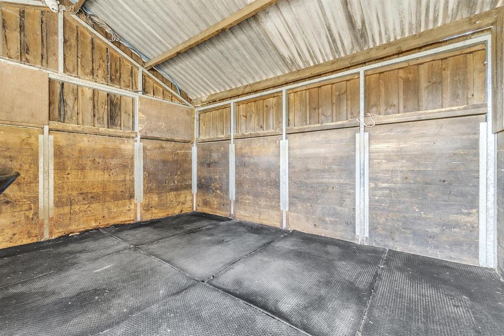 Inside view of stables beside arena