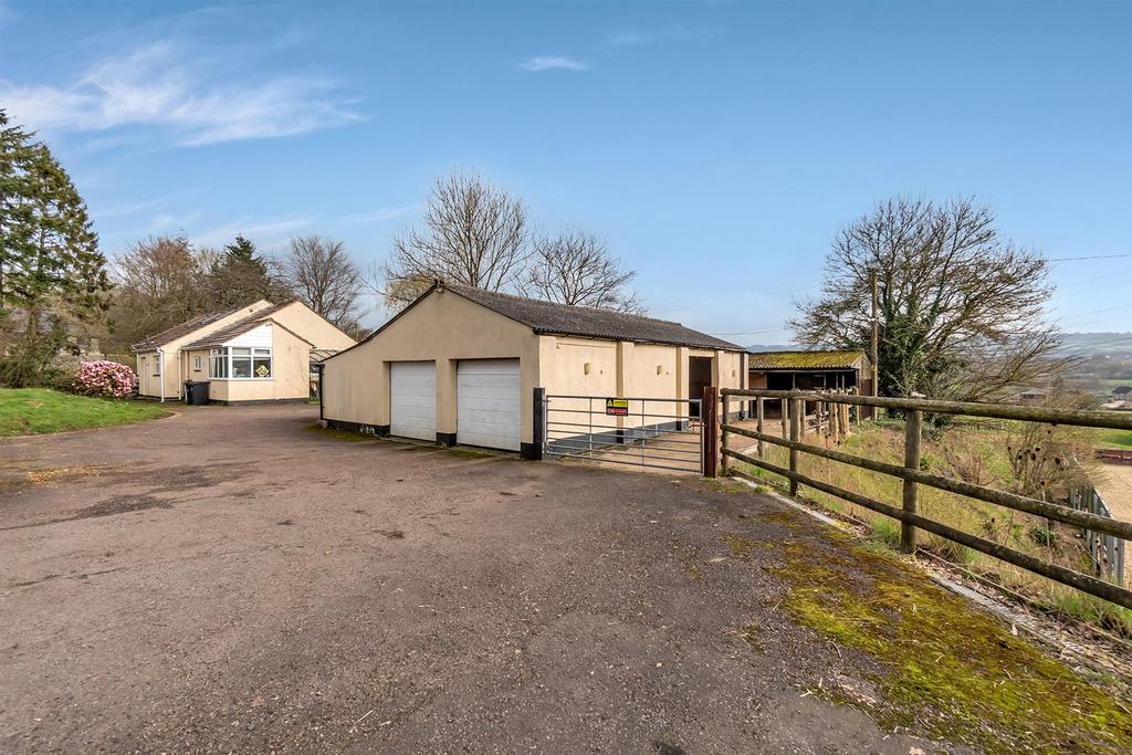 Front view of bungalow an garage