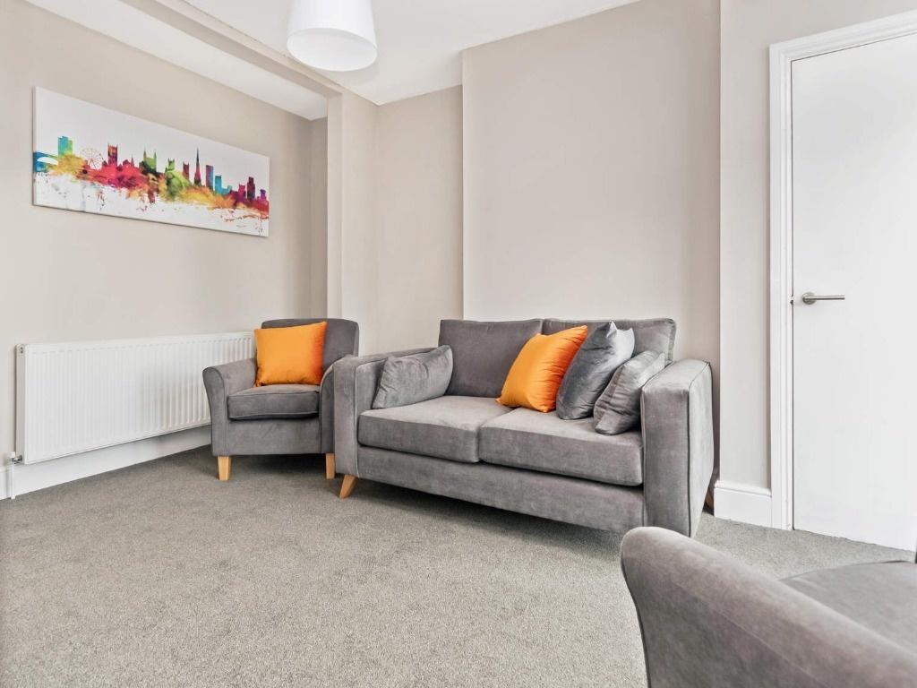 Bright modern lounge with comfy seating...