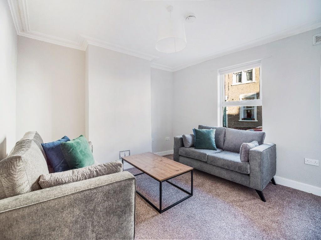 Bright lounge with two sofas and modern decor...