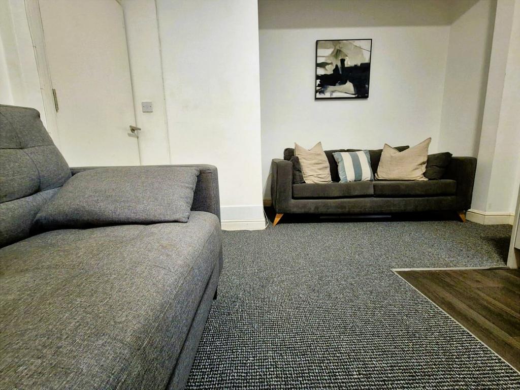 Modern furnished lounge with comfy sofas...