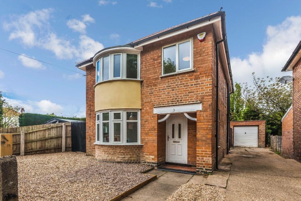Detached house with driveway and garage...