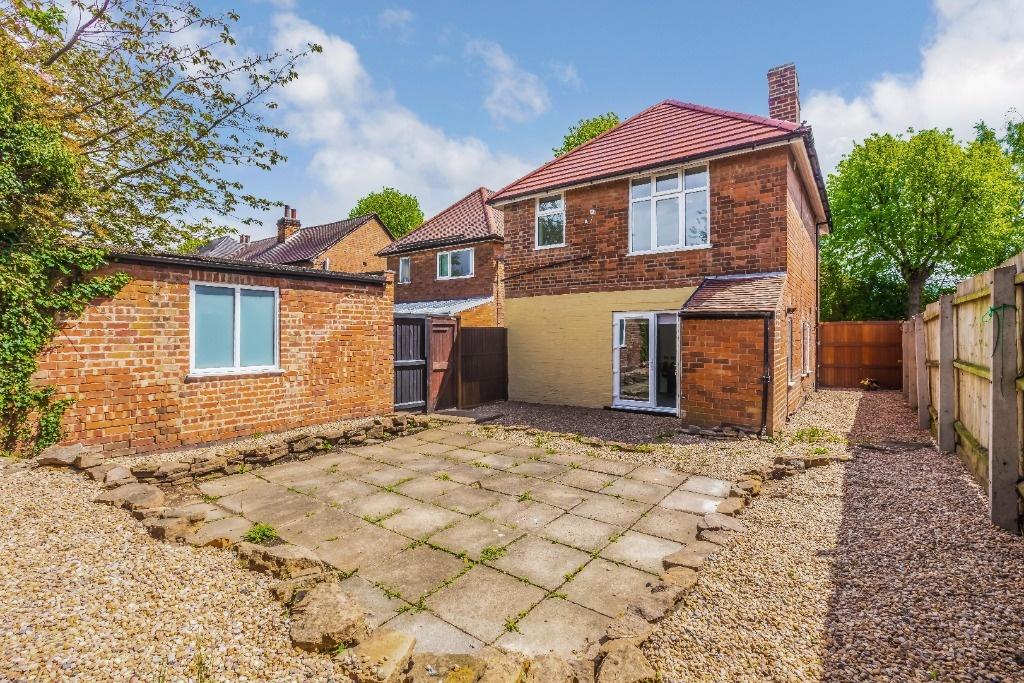 Detached house with paved rear yard and outbuil...