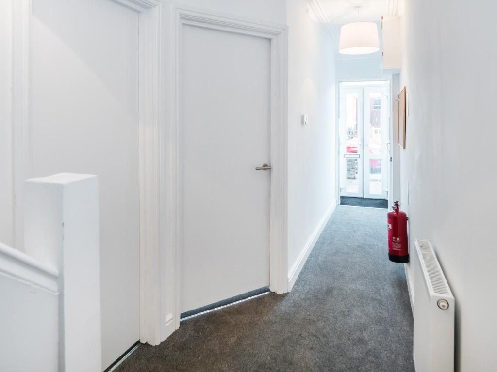 Bright, clean hallway with natural light...