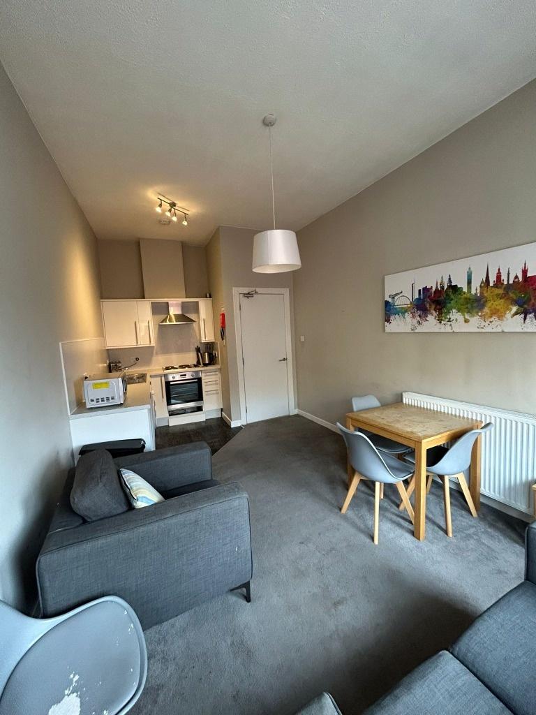 Bright open-plan living area with dining space...