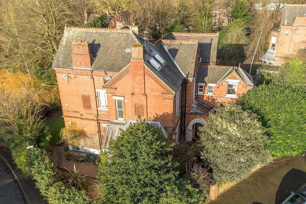 Attractive red‑brick period house with mature t...