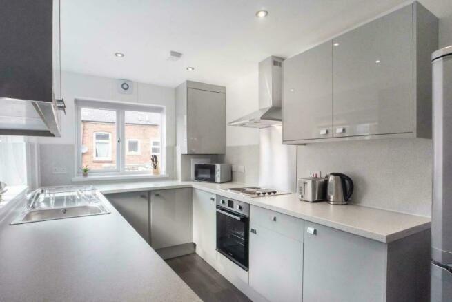 Bright modern kitchen with sleek cabinetry...