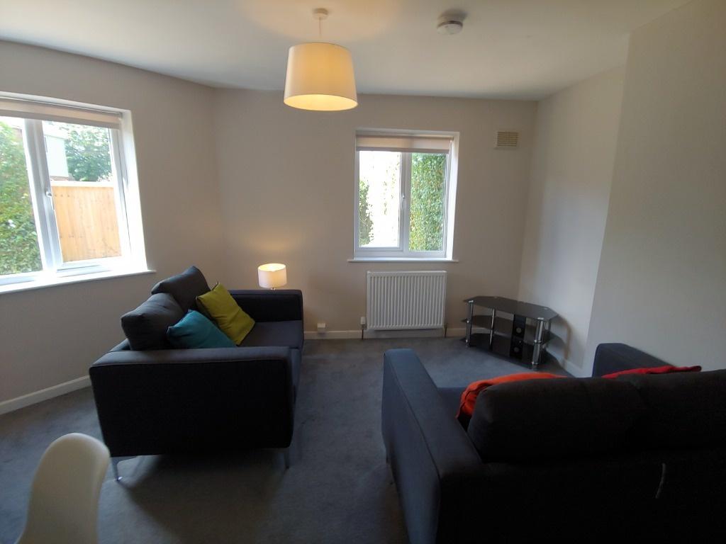 Bright modern lounge with comfy sofas...