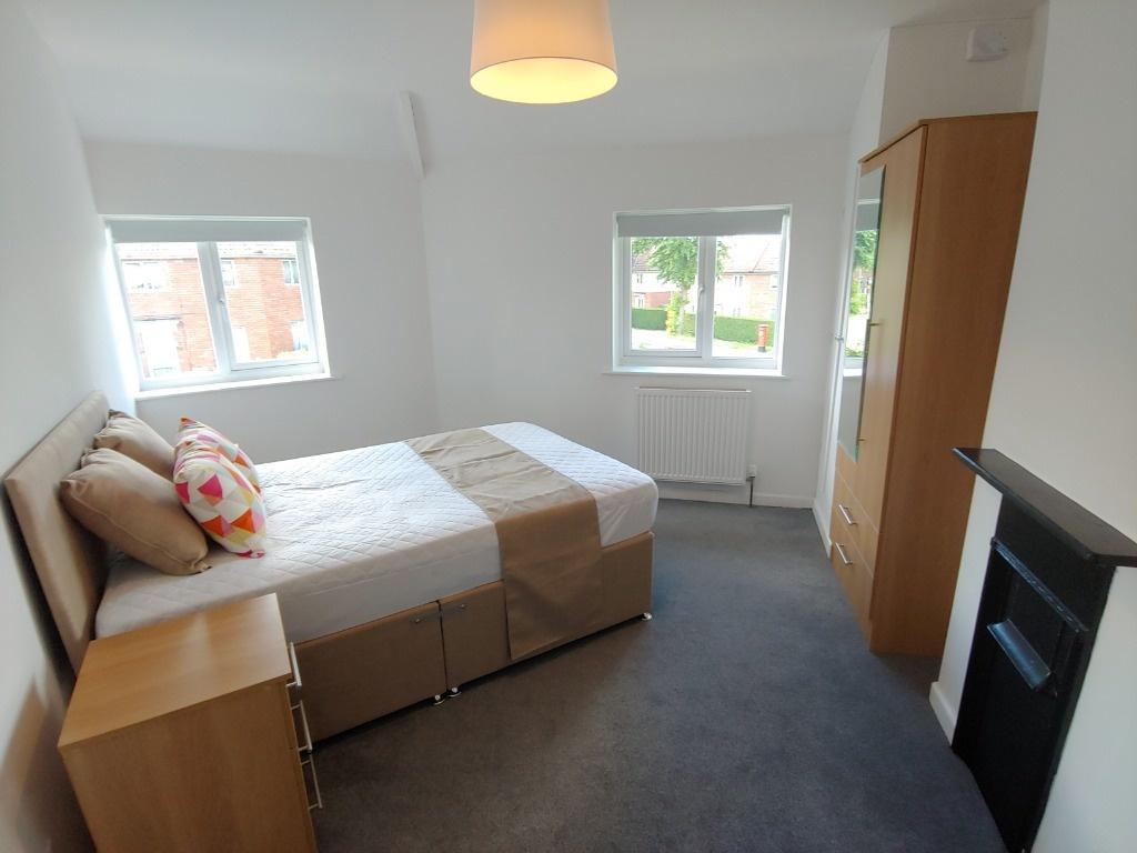 Bright double room with twin beds and wardrobe...