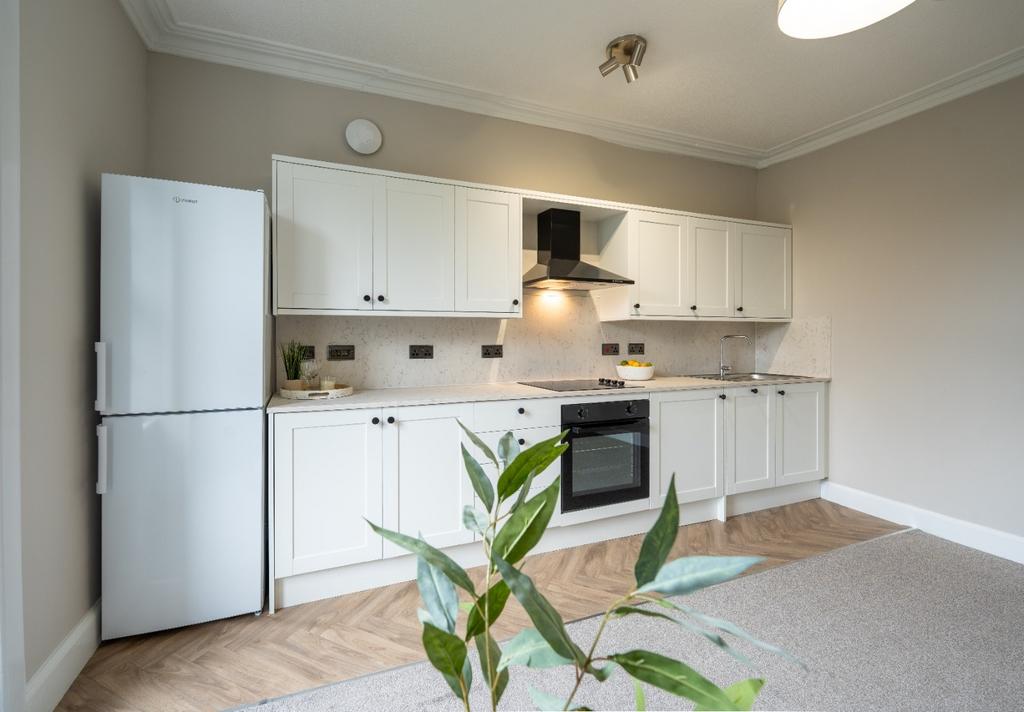 Bright fitted kitchen with modern appliances...