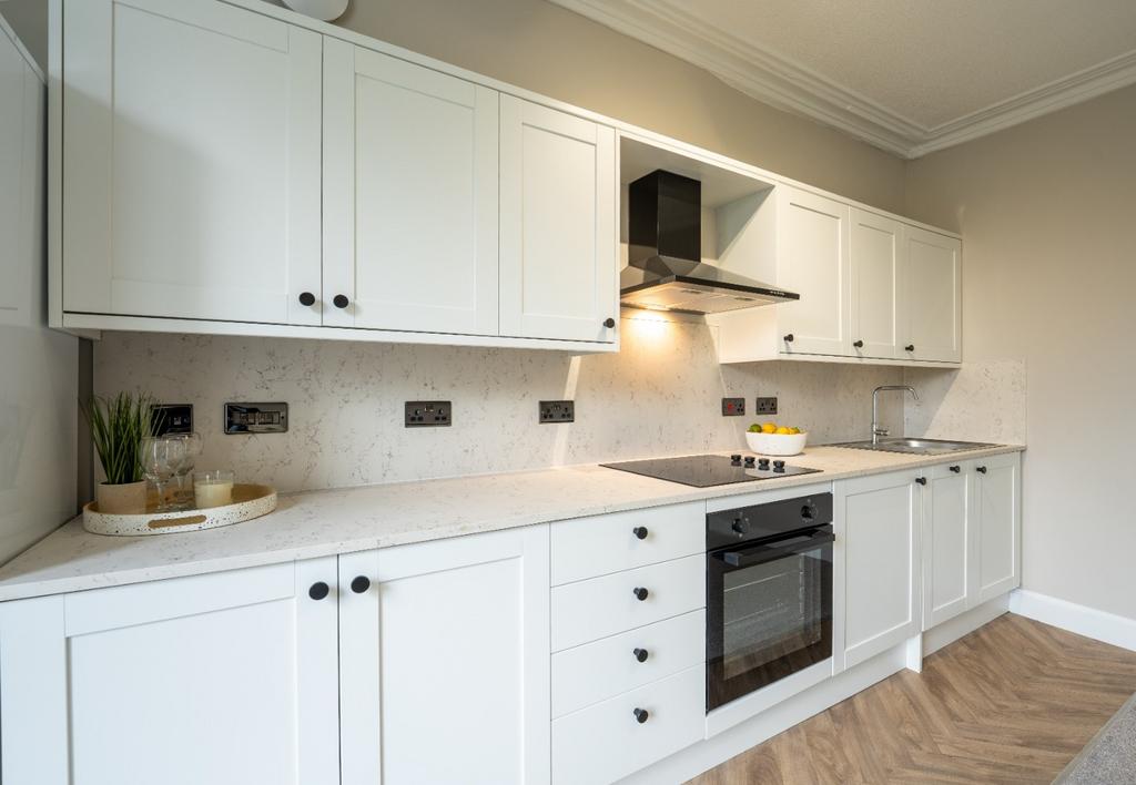 Bright modern kitchen with ample storage...