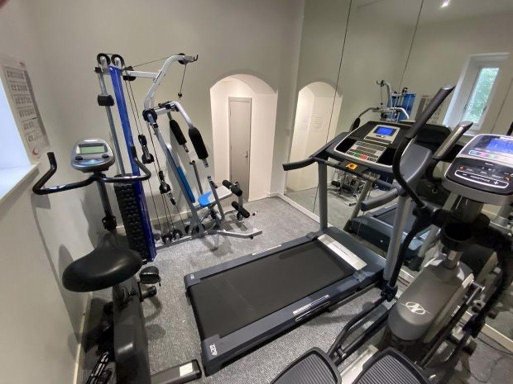 Compact home gym with a variety of cardio and s...
