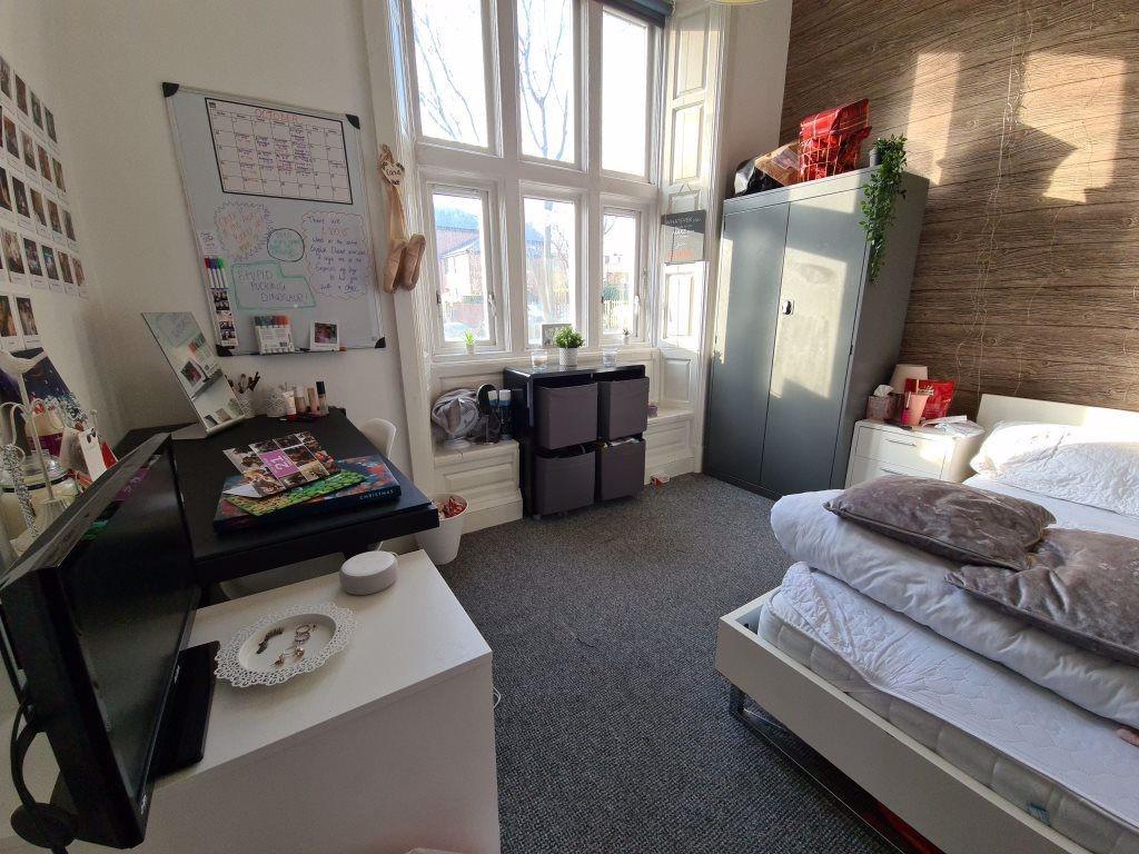 Bright and inviting master bedroom featuring a ...