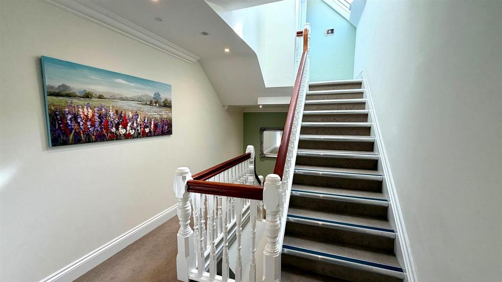 Communal staircase to top floor
