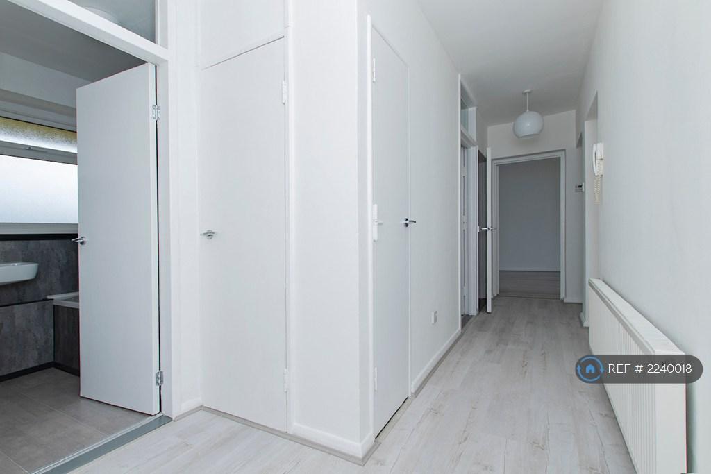 Hallway With Two Storage Cupboards