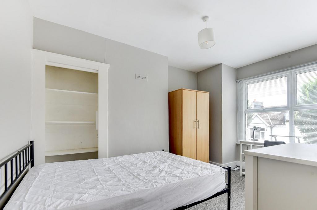 Bright, neatly presented bedroom with a double ...