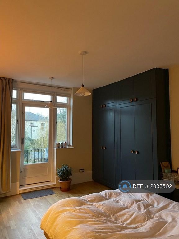 Bedroom Looking Out To Balcony