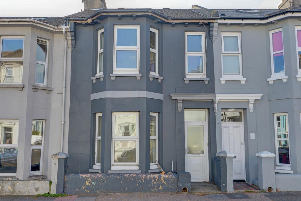 A charming residential property exterior with a...