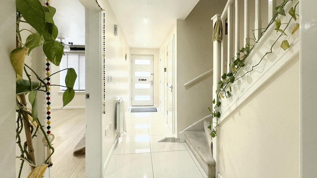Bright, modern hallway with glossy floors...