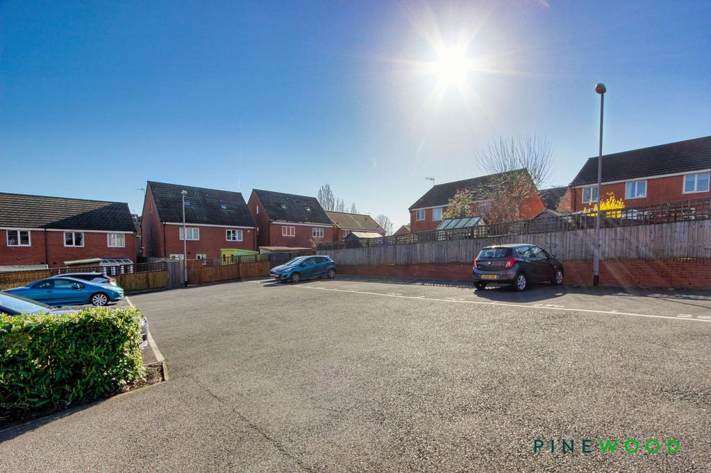 Communal Car Park to Rear