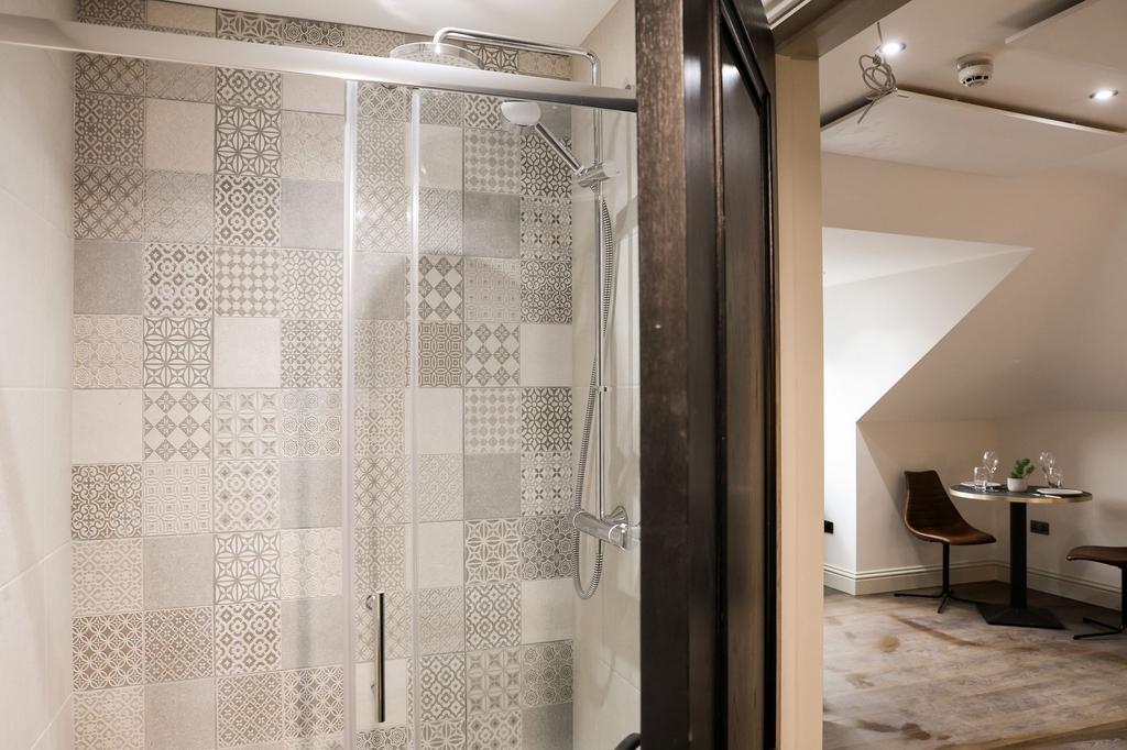 Stylish tiled shower with modern fittings...