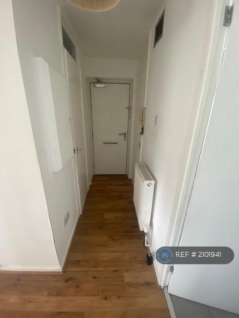 Hallway And Large Storage Cupboards