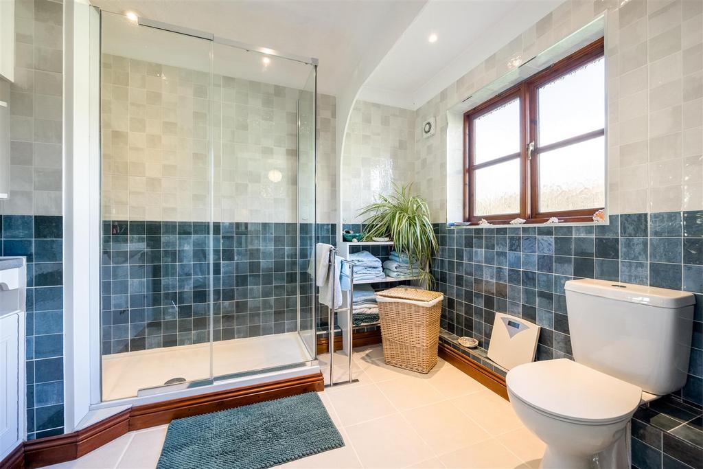 One of three bathrooms