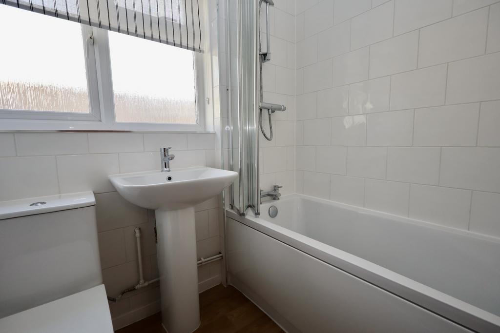Modern bathroom with shower over the bath