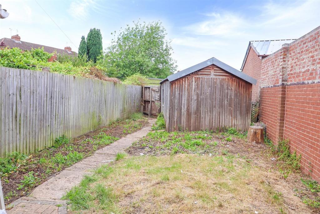 Private enclosed rear garden with shed and path...