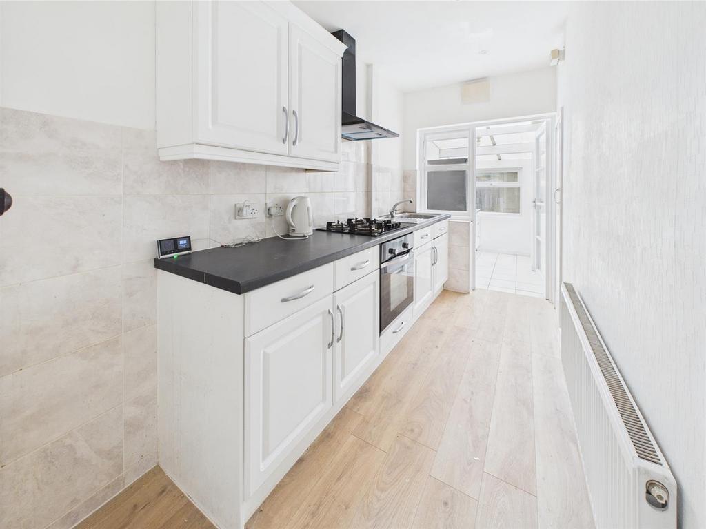 Bright modern galley kitchen with fitted units...