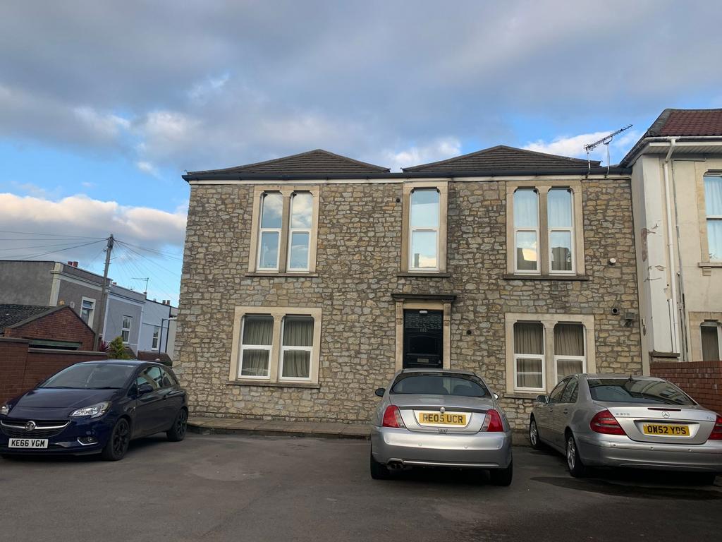 Stone-fronted terraced house with symmetrical w...