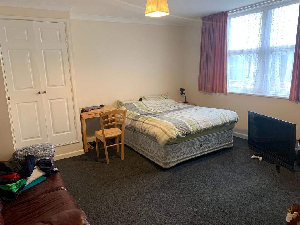 Bright, well-proportioned bedroom with a double...