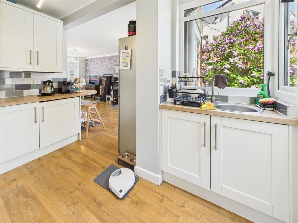 Bright modern kitchen with garden view...