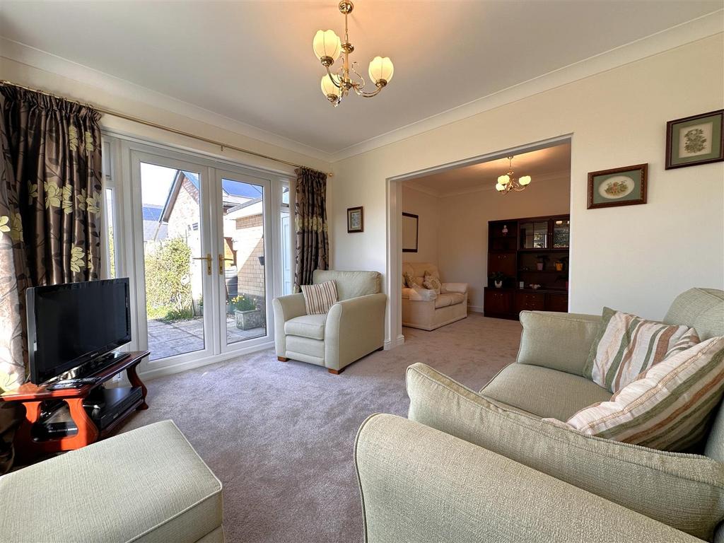 Sitting Room With French Doos 179