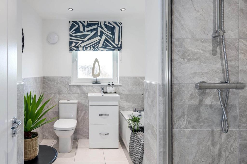 Family friendly bathroom with separate shower